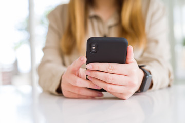 Close up of woman using smartphone