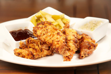 Tasty strips of chicken breast meat fried in flour