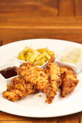 Tasty strips of chicken breast meat fried in flour