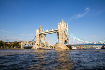Fototapeta na wymiar View of Tower Bridge on the River Thames opening for the Lord Nelson