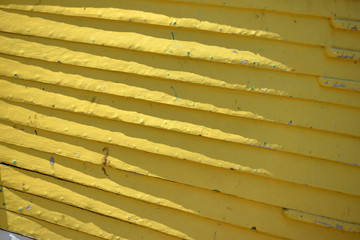 Close up of colourful wooden fishing boat bow