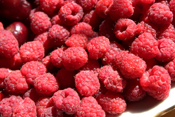Raspberries on a plate close-up