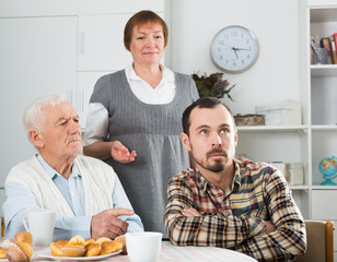 Parents arguing with son