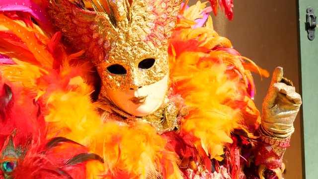 Unidentified people at Venice carnival, carnaval de venise d&eacute;guisement et masque color&eacute; &agrave; burano en Italie