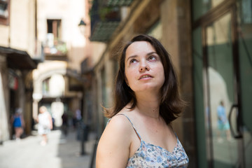 Girl walking in city streets