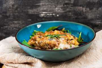 Moussaka, Oriental dish common to Turkey, Greece and the Balkans, consisting of aubergines baked.
