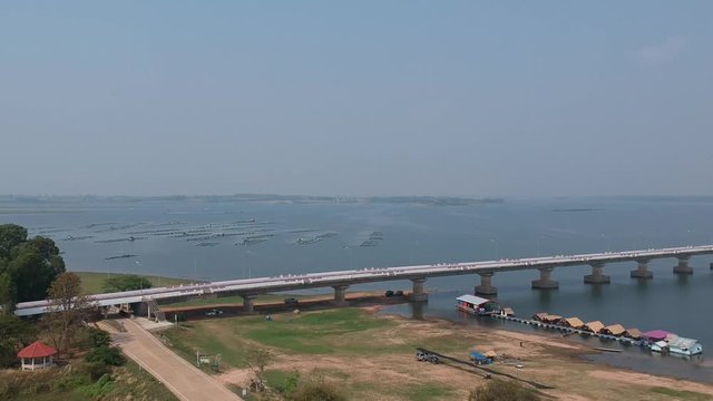Aerial view Thepsuda Bridge over Lampao Reservoir.Thep Sada Bridge the Deja Vu Bridge is a 2-lane reinforced concrete bridge across Lam Pao Dam at Kalasin,Thailand.