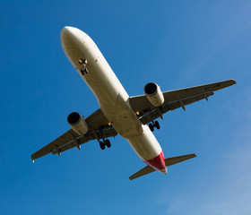 Fototapeta na wymiar Iberia Airlines plane landing