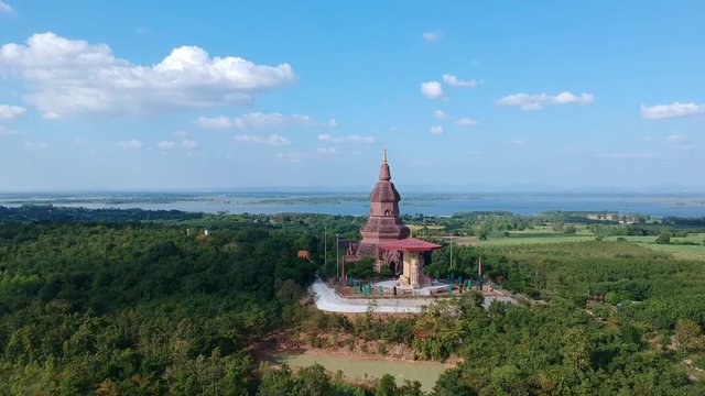 Amazing Thailand PHRA BUDDHA SAIYAT PHUKHAO Wat Putthanimit Pagoda , Wat Phu Khao Temple in Kalasin, Thailand.