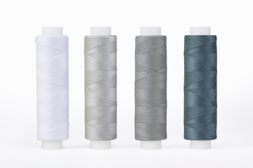 Set of sewing thread coils, miscellaneous colours, isolated on white