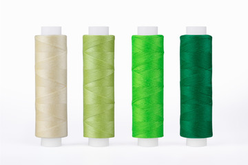 Set of sewing thread coils, miscellaneous colours, isolated on white