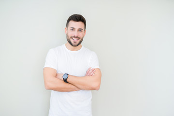 Young handsome man wearing casual white t-shirt over isolated background happy face smiling with...