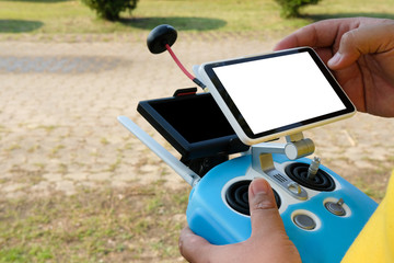 man controlling agriculture drone. remote controller