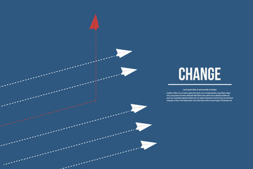 Think differently concept. Red airplane changing direction. New idea, change, trend, courage, creative solution, innovation and unique way concept.