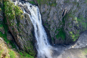 Fototapeta na wymiar beautiful landscape of Voringfossen waterfall in Mabodalen valley.