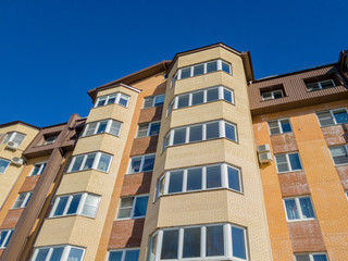 Multistory building. Apartments in the house. Facade.