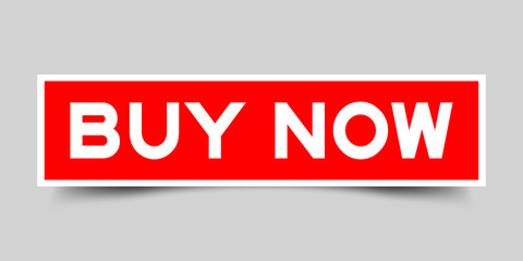 Obraz premium Label sticker in red color square shape as word buy now on white background