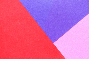Fototapeta premium Abstract red, pink, blue color paper background for design and decoration