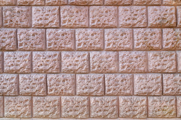 Abstract weathered texture of stained old dark stucco brown and painted red, yellow brick wall background in rural room Grungy rusty blocks of stonework tech darken retro color architecture wallpaper