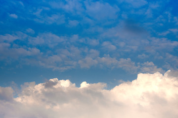 Dramatic blue sky with fluffy clouds texture background.