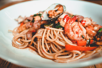 Drunken spaghetti set on wood table background