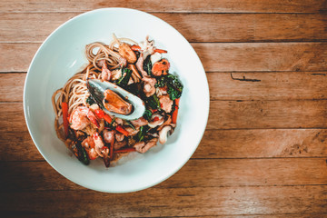 Drunken spaghetti set on wood table background