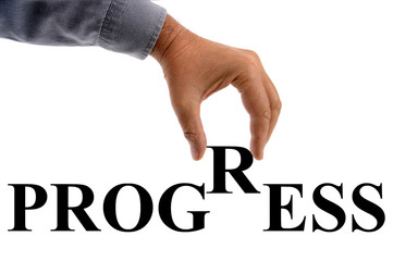 Hand writing the word progress