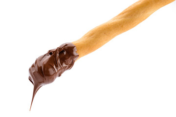 Grissino con cioccolato su fondo bianco, closeup