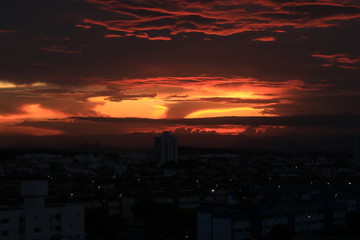 A beautiful sunset in urban landscape like an eruption of the sun. Vila Velha/ES