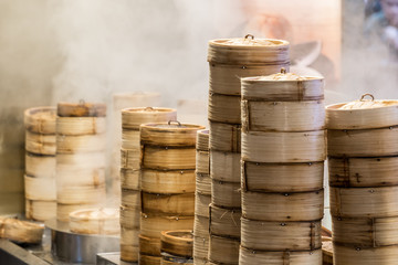 Steamed dim sum bamboo trays by Local street food vendors in Singapore