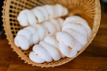 Meringue inside weaving basket. Sweet and melt in your mouth. French, Spanish, Swiss, and Italian cuisine.