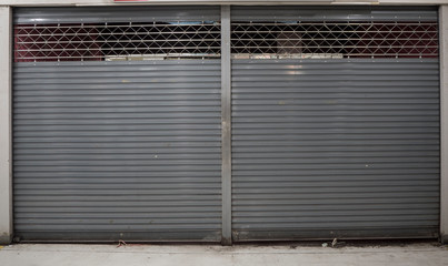 close shutter or rolling door of shop background with copy space