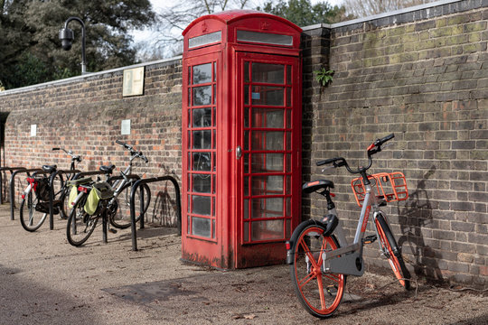 red telephone box - Powered by Adobe
