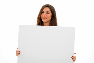 Fototapeta premium young woman holding sign business board. isolated portrait of casual dressed woman. 