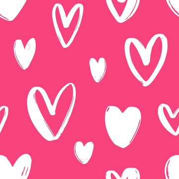 Hand drawn seamless pattern with hearts on bright pink background. Festive backdrop with love, passion and romance symbols. Vector illustration for Valentines day textile print, wrapping paper.