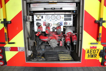 Fire Engine close up pumps hose and equipment from London Fire brigade England UK