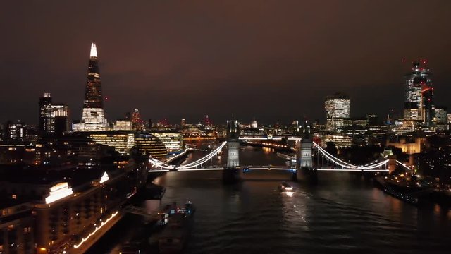Aerial Drone Tower Bridge The Shard Building London Thames River Traffic Cars London Skyline Lights At Night
