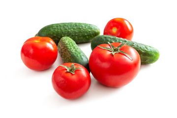 Cucumbers and tomatoes on the table