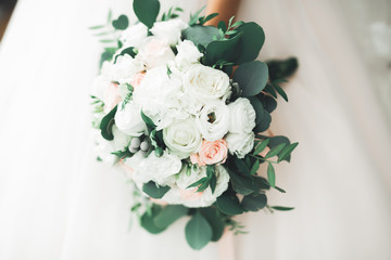 Wonderful luxury wedding bouquet of different flowers