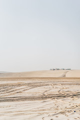 Qatari desert where water intersects with the sea