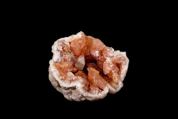 Macro mineral stone Pink Amethyst on a black background