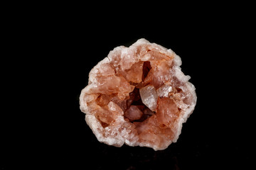 Macro mineral stone Pink Amethyst on a black background