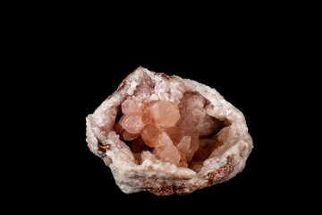 Macro mineral stone Pink Amethyst on a black background