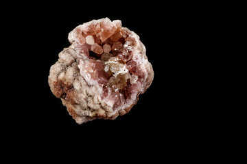 Macro mineral stone Pink Amethyst on a black background