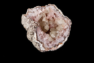 Macro mineral stone Pink Amethyst on a black background