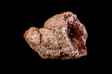 Macro mineral stone Pink Amethyst on a black background