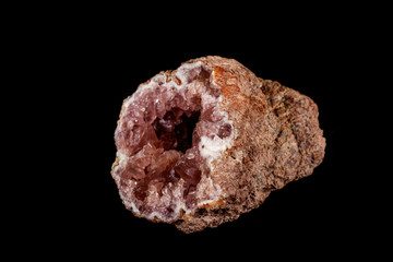 Macro mineral stone Pink Amethyst on a black background