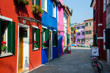 The street of Burano, Italy. Fairytale colorfull houses. 