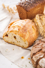 Assortment of freshly baked loaf of bread. Home bakery. Homebaked bread
