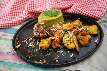 roasted sleeves chicken with potatoes and barbecue sauce